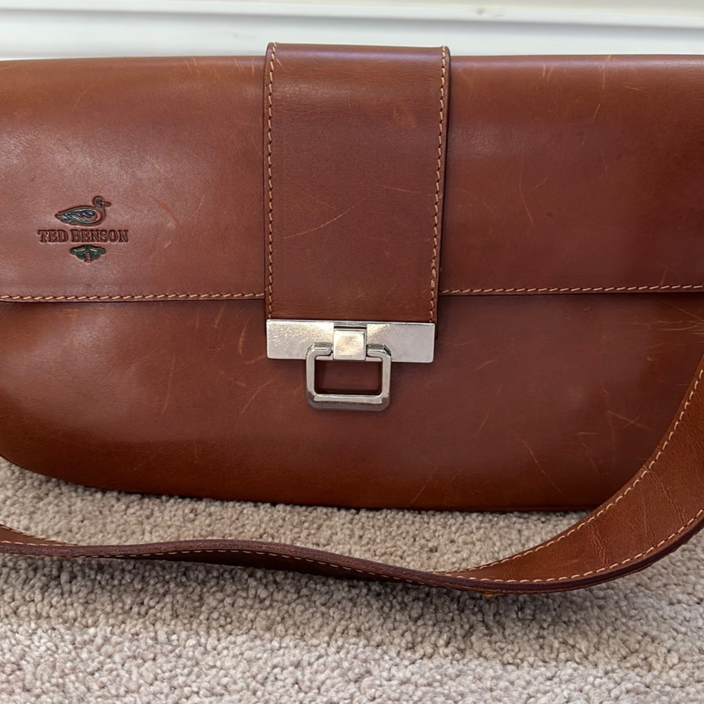 Ted Benson, made in Italy, 11” x 7” leather hand bag.